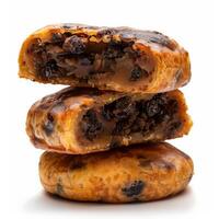 Three delicious Eccles cakes, stacked and ready to eat photo