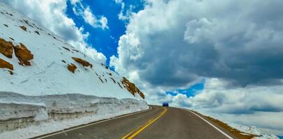 The road to the snow-covered mountain Pikes Peak, Colorado, US photo