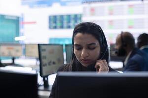 Telecommunications operator transmitting important big data analysis for the annual reports, working on ways to increase profit and expand the business globally. Forecast affiliates. photo