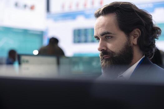 General director calculates cost and revenue numbers before obtaining more funds from investors, examining annual key performance metrics. Business analyst working with sales reports. photo