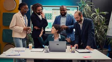 Employees team showing their project updates to the supervisor, crazy manager yelling at her staff members and being displeased with their progress. Disappointed leader judging associates. Camera B. photo