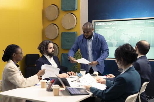 Business associates reviewing key performance indicators within the enterprise activity. Conducting evaluations and discuss training to foster professional development, enhance team efficiency. photo