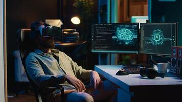Man using VR headset to do programming job, getting scared after AI becoming sentient. Developer solving tasks on PC with virtual reality, alarmed by self aware artificial intelligence, camera A photo