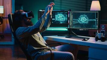 IT expert using virtual reality to make artificial intelligence become sentient, smiling after seeing self awareness signs. Man with VR glasses on happy after achieving AI superintelligence, camera A photo