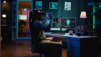 Developer using VR headset panicking after sentient artificial intelligence gains autonomy, threatening humanity. Programmer using virtual reality tech worried about AI having consciousness, camera B photo