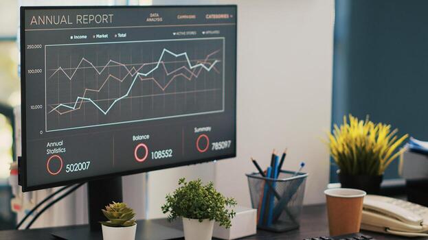 Wheelchair in inclusive financial department office with forecasting graphs on laptop. Economic annual revenue report on notebook in workspace with accessibility for workers with disability, close up photo