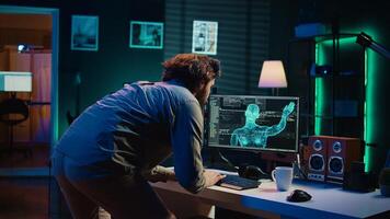 Man jumping out of chair from shock after being greeted by sentient AI gaining superintelligence, bowing down to it. Programmer doing worshiping reverence in front of artificial intelligence, camera B photo