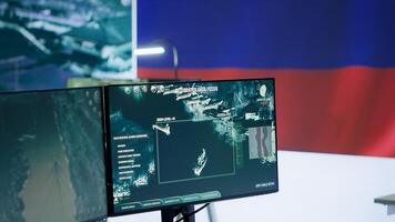 Modern army control center monitoring activity on surveillance systems, russian military armed forces brainwashing the population and managing propaganda to scam citizens. Camera A. photo