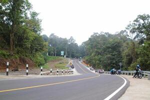 Highway atmosphere in Pusuk Forest on March 9, 2024 - Sembalun, East Lombok, Indonesia photo