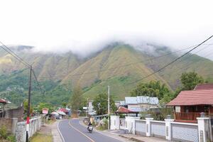 atmosphere of life in Sembalun with natural views surrounded by mountains on March 9 2024 - Sembalun, East Lombok, Indonesia photo