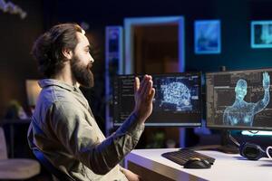 Self aware AI gaining humanoid form inside cyberspace, waving hand, saluting smiling developer. Artificial intelligence becoming sentient, greeting cheerful IT admin, AI singularity concept photo