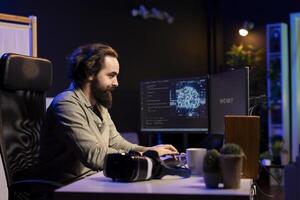IT specialist smiling seeing AI becoming sentient, talking with him, asking questions. Computer engineer happy about artificial intelligence wishing to befriend humanity after becoming self aware photo
