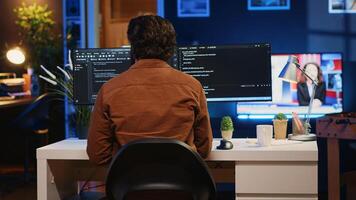 Engineer arriving in home office with mug of coffee in hand, ready to start coding using javascript. IT expert beginning remote work shift, holding cup of tea, updating company software, camera A photo
