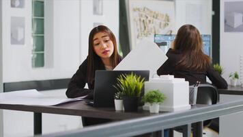 Structural developer on videocall with specialist to confirm proper design features, collaborating with construction personnel to deal with alignments and scaling on videoconference connection. photo