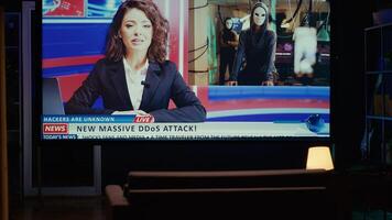 Smart TV displaying news program broadcasting with journalist talking about cybercriminals attacks subject, close up shot. Big television screen showing VOD channel with newscast coverage of hackers photo