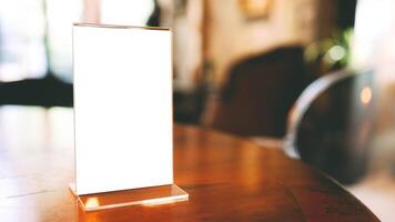 cafe menu. Menu frame standing on wood table in Bar restaurant cafe. space for text marketing promotion photo