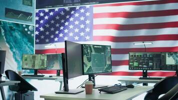 Empty modern base of operations used by the US military armed forces, safeguarding state secrets and ensuring security protocols. High tech surveillance gear used for intelligence. Camera B. video