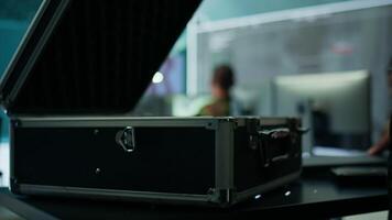 Military personnel in a high tech control room gathers intelligence for data integration in defense operations, processing real time surveillance systems. Support troops in field missions. Camera B. video