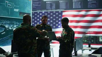 Government intelligence officers in control room manage surveillance operations, analyze real time data and coordinate security measures to protect national interests. Secret service. Camera A. video