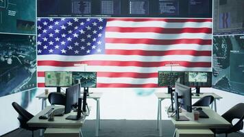 Empty American military control center equipped with high tech gear and a big screen, space used as an army drone control and monitoring room. Protecting national interests. Camera B. video