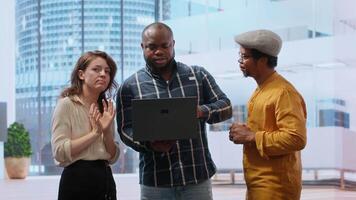 Business professionals strategizing an office relocation during a tour with the realtor, analyzing blueprints and planning the architectural layout of the new property. Rental agreement. Camera B. video