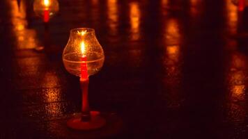 A candle is are lit at borobudur temple. symbol of hope photo