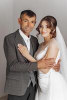 A man and a woman are posing for a picture photo