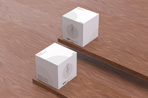 mockup of two square boxes with thread to close on dark brown wooden backdrop psd