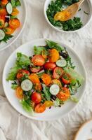 Fresh Salad With Tomatoes, Cucumbers, and Jalapenos photo