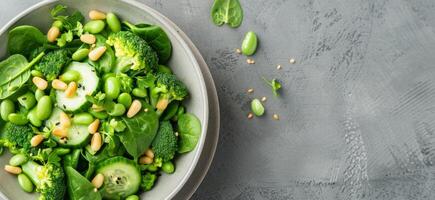 Green Salad With Broccoli, Edamame, and Cucumber photo