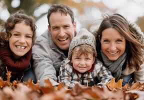 Happy Family In Autumn Leaves photo
