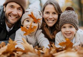Happy Family In Autumn Leaves photo