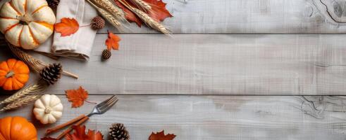 Fall Table Setting With Pumpkins and Leaves photo