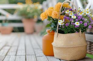 Flowers in Wicker Basket on Wooden Deck photo