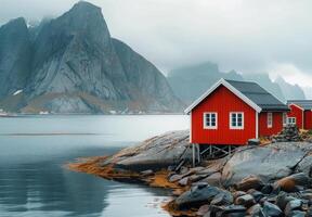 Red Cabin on Rocky Shore in Norway photo