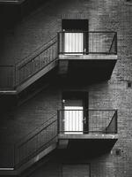 Black And White Fire Escape On Brick Building photo