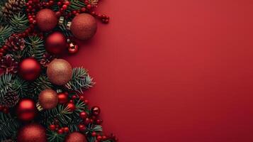 Christmas Ornaments and Pine Branches on Red Background photo