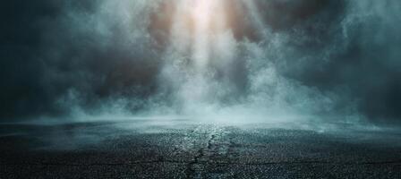 A Single Light Beam Pierces Through Dense Fog Over an Empty Road at Night photo