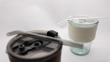 Tumbler in the form of a glass or glass mug with a modern design photo