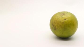 Orange fruit from Indonesia with a white background photo
