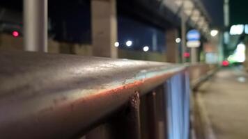 Iron handrail on the side of the road in Jakarta photo