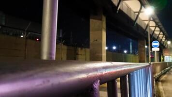Iron handrail on the side of the road in Jakarta photo