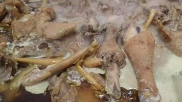 Opor chicken is being cooked photo