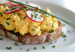 Egg Salad Sandwich With Radish and Chives photo
