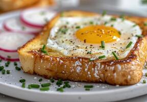 Fried Eggs on Toast With Chives photo
