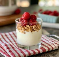 Yogurt Parfait With Granola and Raspberries photo
