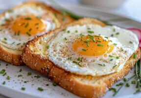 Fried Eggs on Toast With Chives photo