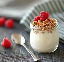 Yogurt With Granola and Raspberries photo