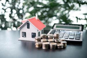 Securing a loan to finance the purchase of a property, the entrepreneur invested in real estate to grow their business using the house as both a home and a valuable asset under a mortgage agreement. photo