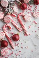 Candy Canes and Ornaments on Marble photo